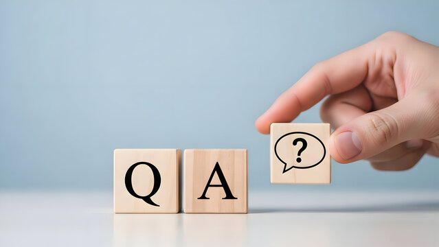 Hand places question mark speech bubble block next to QA blocks answer cube - Powered by Adobe