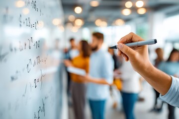 Close-up of a student's hand writing mathematical equations on a white board with a marker in a modern classroom setting with blurred classmates