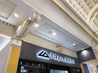 Naklejka premium Trailberg store interior with ornate ceiling and gold accents in Manchester, UK