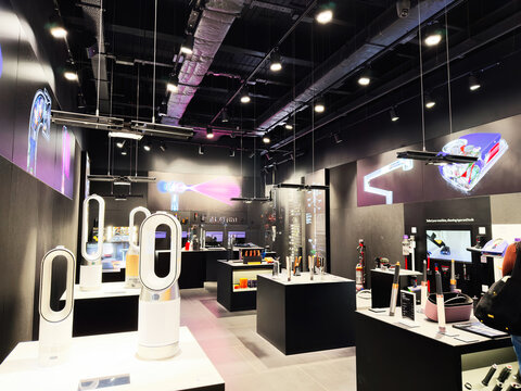 Modern tech Dyson showroom in Manchester featuring air purifiers, bladeless fans, and smart appliances