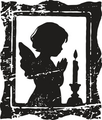 Obraz premium Silhouette of praying angel child with wings near lit candle in rustic frame