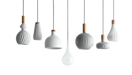 A collection of white, decorative pendant lights, each with a unique shape, against black