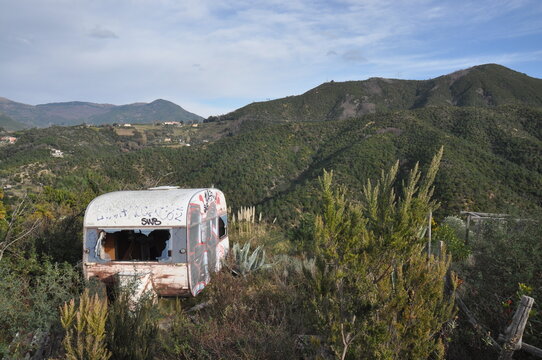 an old broken caravan parked near the trail from Riva Trigoso to Punta Baffe, Genoa province, Liguria, Italy
