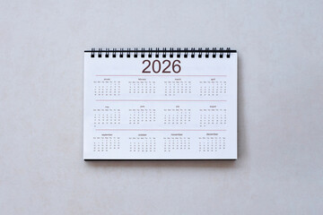 2026 Desk Calendar on Grey Background, Top View