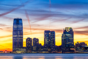 Jersey City skyline at sunset as viewed from Tribeca, New York across the Hudson River