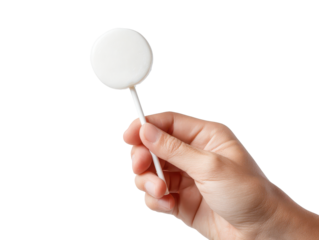 Human hand holding a round white lollipop on a stick, fingers gently gripping the handle, smooth candy disk facing forward with subtle shine and clean edges isolated on transparent background.
