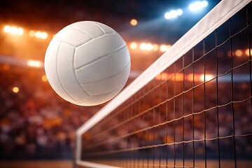 Volleyball in motion near net during indoor match with audience