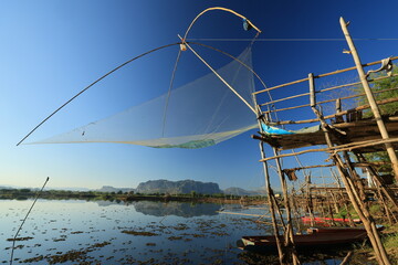Fishing equipment with the view of Nong Samor lake and Phu Pha Man mountain as a backdrop.
Phu Pha Man ,Khon Kaen,THAILAND