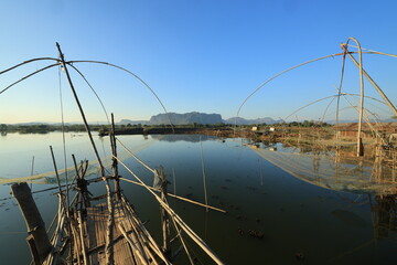 Fishing equipment with the view of Nong Samor lake and Phu Pha Man mountain as a backdrop.
Phu Pha Man ,Khon Kaen,THAILAND