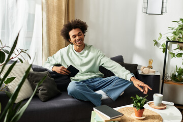 Handsome young man enjoying a moment of relaxation in a cozy modern living space