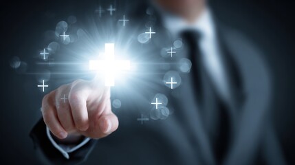 Obraz premium Man in suit points to a glowing plus sign, surrounded by smaller, illuminated symbols