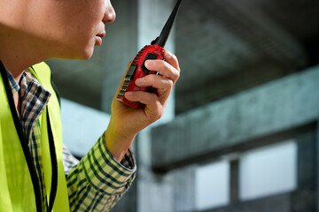 Civil engineers inspect building construction projects, checking the structural integrity and safety measures.