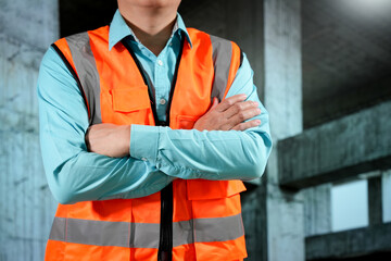 Civil engineers inspect building construction projects, checking the structural integrity and safety measures.