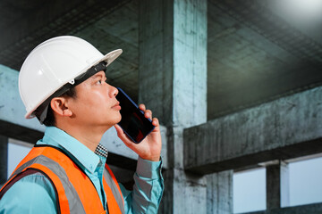 Civil engineers inspect building construction projects, checking the structural integrity and safety measures.