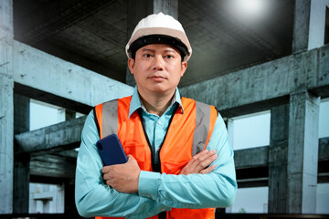 Civil engineers inspect building construction projects, checking the structural integrity and safety measures.