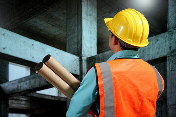 Civil engineers inspect building construction projects, checking the structural integrity and safety measures.