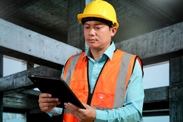 Civil engineers inspect building construction projects, checking the structural integrity and safety measures.