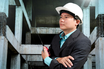 Civil engineers inspect building construction projects, checking the structural integrity and safety measures.