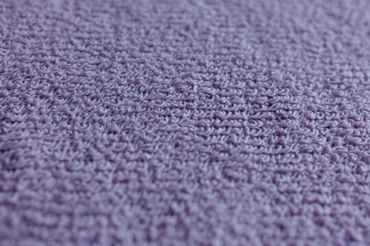Soft purple fleece loopback fabric, reverse side textile texture