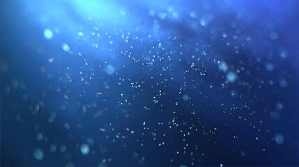 Fototapeta premium Abstract, blurred, and sparkling blue background, light rays, and bokeh effect