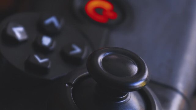 Close up of gaming joystick showcasing intricate design and buttons for enhanced gameplay experience