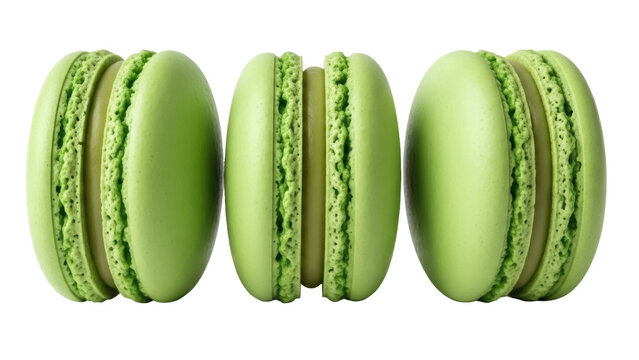 Three green pistachio macarons isolated PNG, delicious French dessert on transparent background for patisserie and confectionery designs