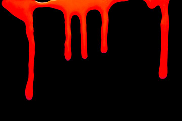 red paint drips on a black background