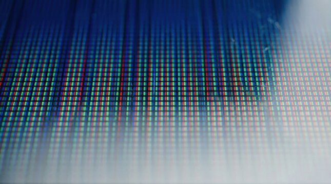 Closeup of RGB pixel display macro shot,high-resolution screen technology,LED matrix grid pattern,red green blue color subpixel layout,electronic display detail background