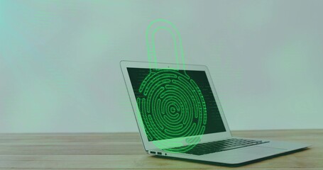 Displaying silver laptop with neon-green fingerprint padlock on desk, pale-green wall, copy space