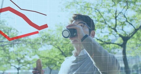 Drinking man standing outdoors in shirt, sweater, glasses, holding mug and sandwich, data overlay