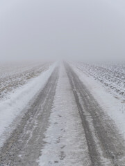 road in the snow field 