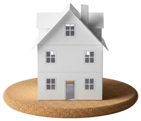 White cardboard paper house model standing on round cork coaster on a transparent background