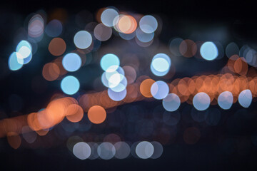 Vibrant city lights at night with colorful bokeh effect