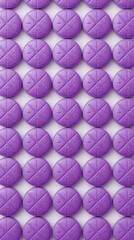 Obraz premium Uniform purple pills arranged in a grid