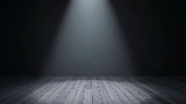 Shining overhead spotlight widening, beam softening, round highlight on wood floor, dark backdrop