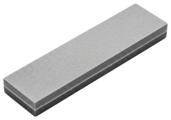 Two tone abrasive whetstone block for sharpening metal blades isolated on a transparent background