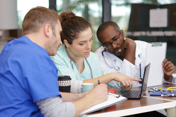 team of doctors having lunch together