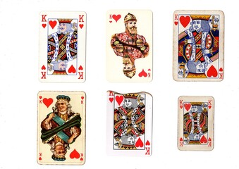 A vintage king of hearts playing card in six different designs.