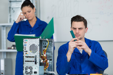 a student is learning electronics