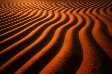 Close up of orange desert sand dune ripples