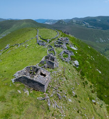 A group of ruined Pasiegan cabins located near Yera, called Caba&ntilde;al "La Marrulla," at an altitude of 1,380 meters. Vega de Pas Municipality, Pasiegan Valleys, Cantabria, Spain, Europe