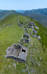 A group of ruined Pasiegan cabins located near Yera, called Caba&ntilde;al "La Marrulla," at an altitude of 1,380 meters. Vega de Pas Municipality, Pasiegan Valleys, Cantabria, Spain, Europe