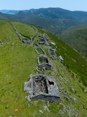 A group of ruined Pasiegan cabins located near Yera, called Caba&ntilde;al "La Marrulla," at an altitude of 1,380 meters. Vega de Pas Municipality, Pasiegan Valleys, Cantabria, Spain, Europe