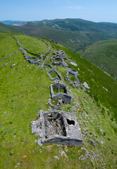 A group of ruined Pasiegan cabins located near Yera, called Caba&ntilde;al "La Marrulla," at an altitude of 1,380 meters. Vega de Pas Municipality, Pasiegan Valleys, Cantabria, Spain, Europe
