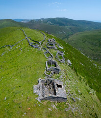 A group of ruined Pasiegan cabins located near Yera, called Caba&ntilde;al "La Marrulla," at an altitude of 1,380 meters. Vega de Pas Municipality, Pasiegan Valleys, Cantabria, Spain, Europe