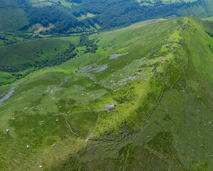 A group of ruined Pasiegan huts located near Yera. Vega de Pas Municipality. Pasiegan Valleys. Cantabria. Spain. Europe