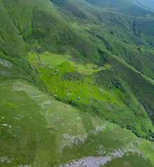 A group of ruined Pasiegan huts located near Yera. Vega de Pas Municipality. Pasiegan Valleys. Cantabria. Spain. Europe