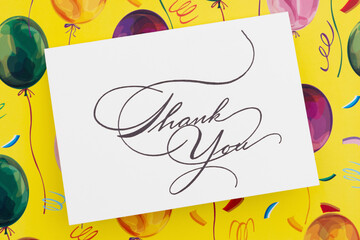 Thank You calligraphy card with festive balloon