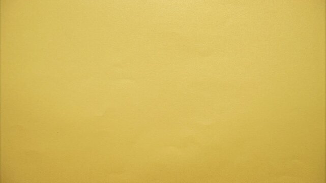 White paper tearing open from the center of the screen, revealing gold paper underneath. Paper tearing from the center as a dynamic transition effect. Stop motion animation