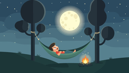 Fototapeta premium Boy Relaxing In Hammock Under Moonlight With Campfire Outdoor Adventure